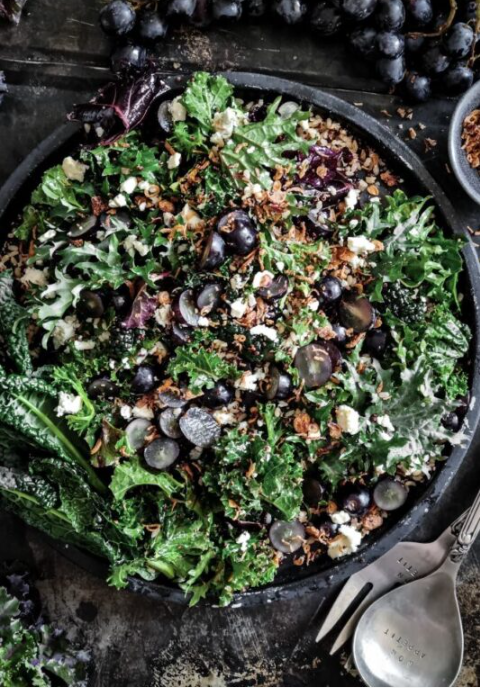 Gourmet leafy salad with fresh grapes, mixed grains & feta.